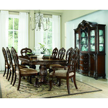 Crofton 11 piece discount padded dining set